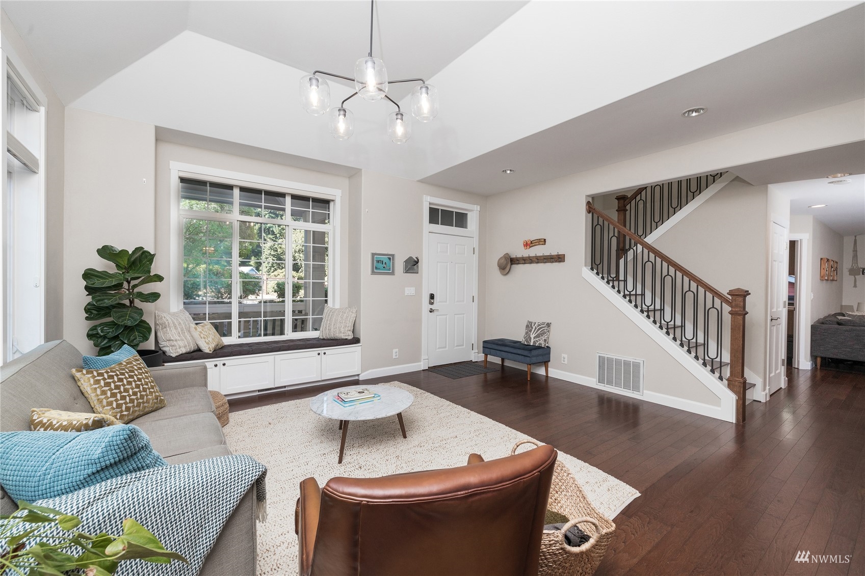 9419 Northeast 175th Street Bothell, WA 98011 - Photo 4 of 28 a living room with furniture and a large window