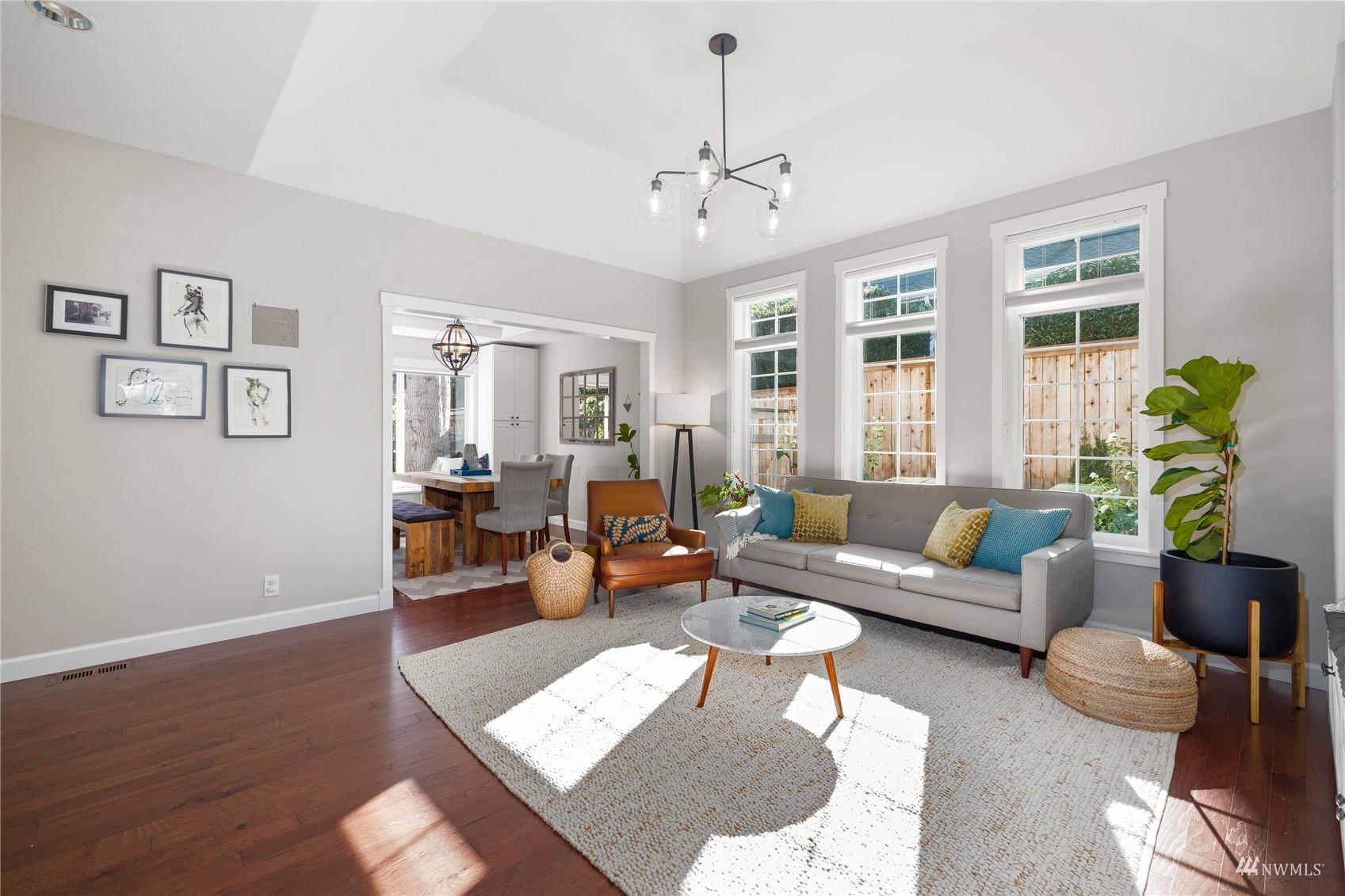 9419 Northeast 175th Street Bothell, WA 98011 - Photo 5 of 28 a living room with furniture and wooden floor