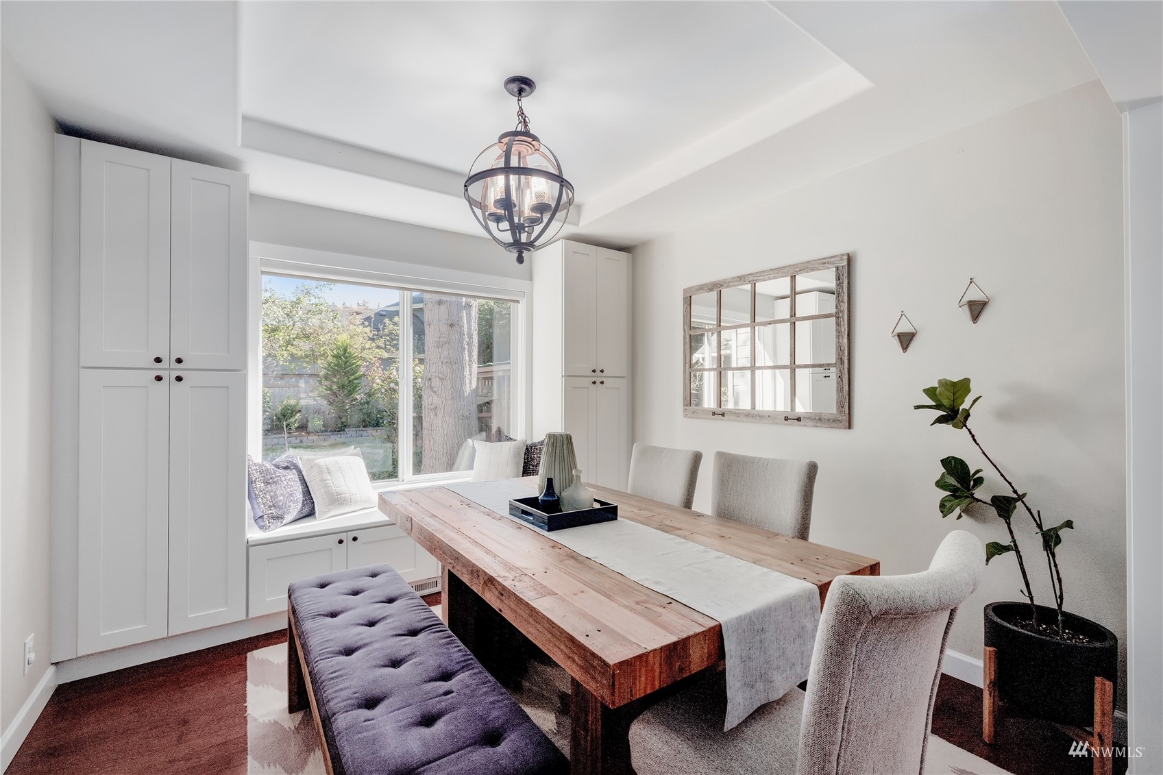 9419 Northeast 175th Street Bothell, WA 98011 - Photo 6 of 28 a view of a dining room with furniture wooden floor and chandelier