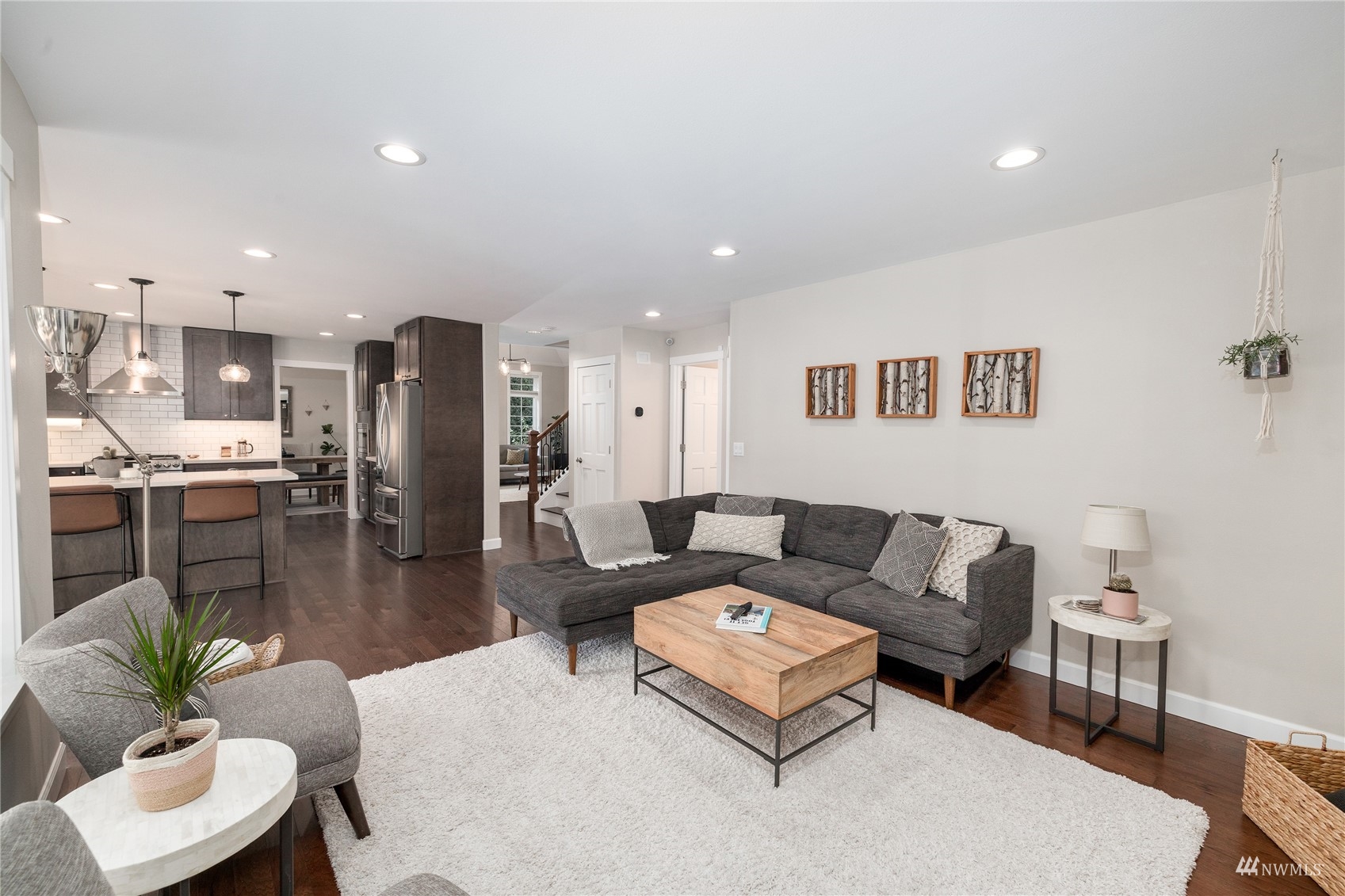 9419 Northeast 175th Street Bothell, WA 98011 - Photo 8 of 28 a living room with furniture kitchen and a table
