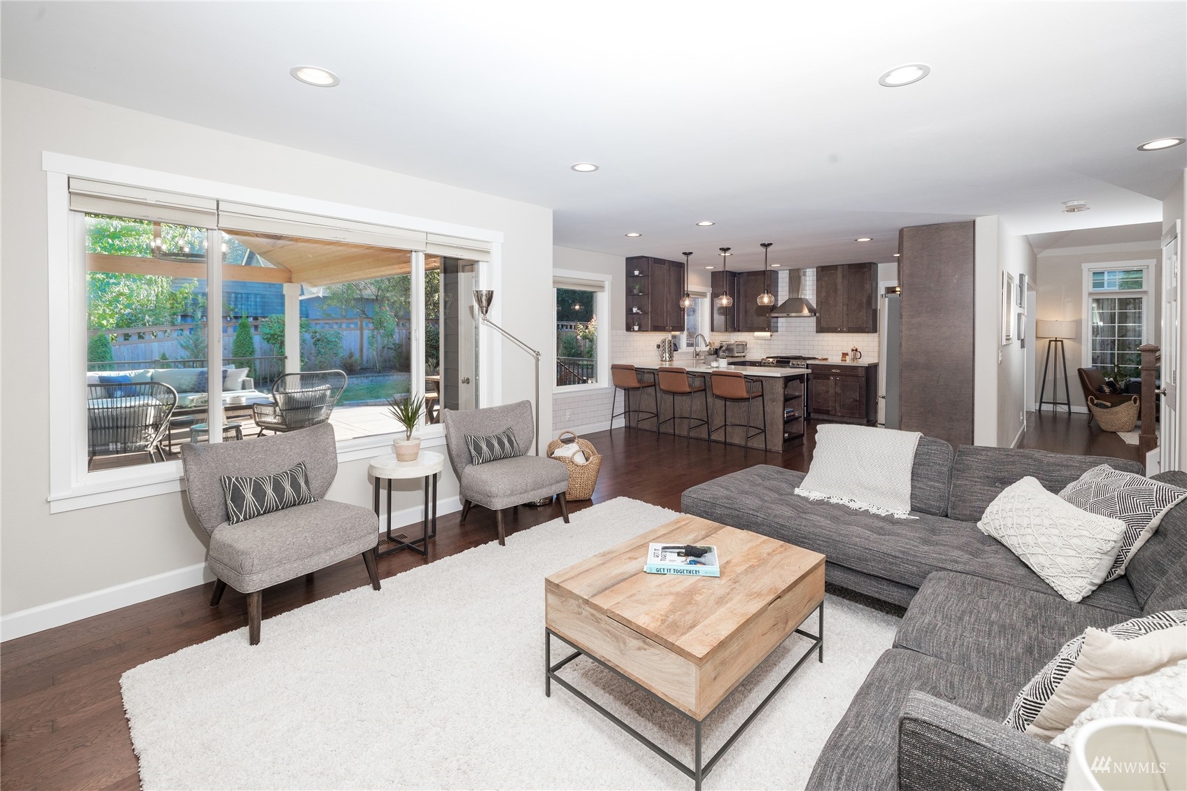 9419 Northeast 175th Street Bothell, WA 98011 - Photo 9 of 28 a living room with furniture and a large window