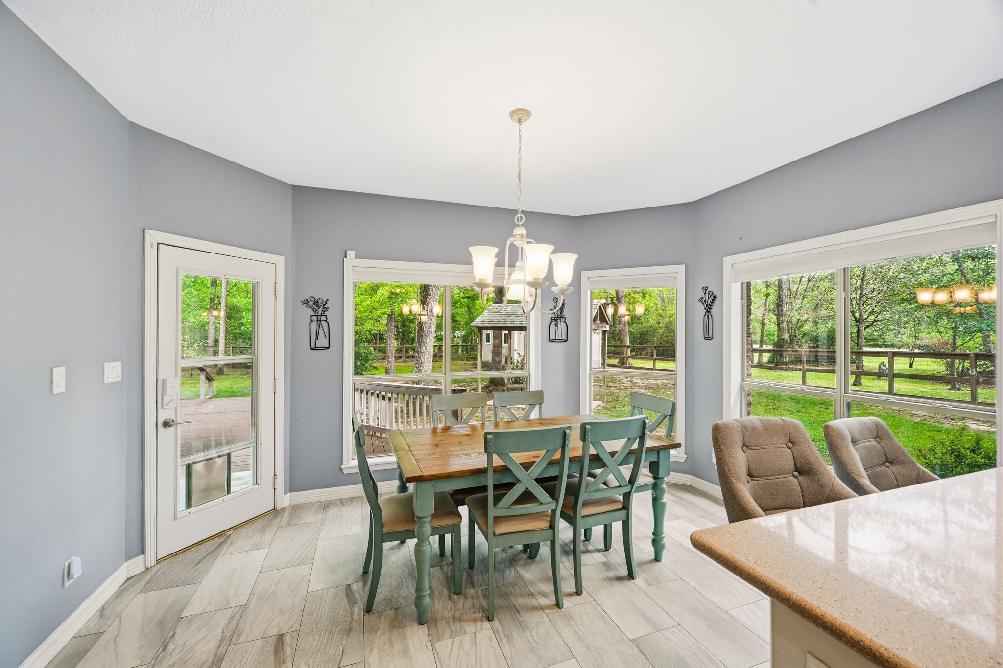 11995 White Oak Crossing Conroe, TX 77385 - Photo 11 of 44 a view of a dining room with furniture window and outside view