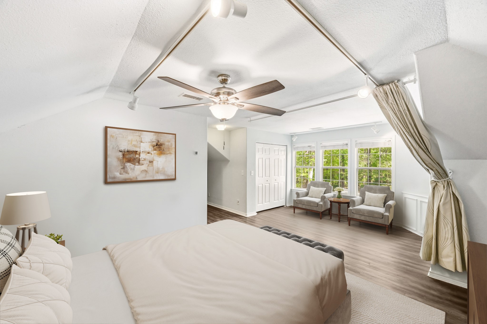 11995 White Oak Crossing Conroe, TX 77385 - Photo 28 of 44 a bedroom with a large bed and a large window