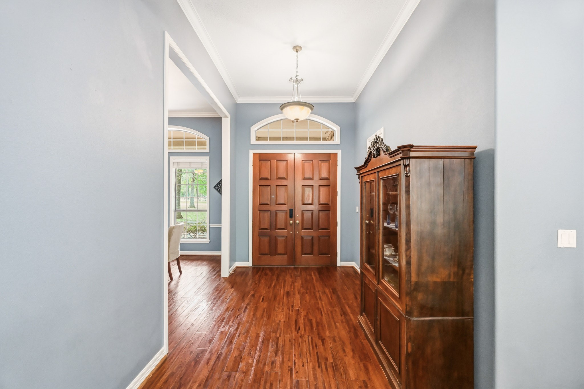 11995 White Oak Crossing Conroe, TX 77385 - Photo 3 of 44 wooden floor in an empty room with a window