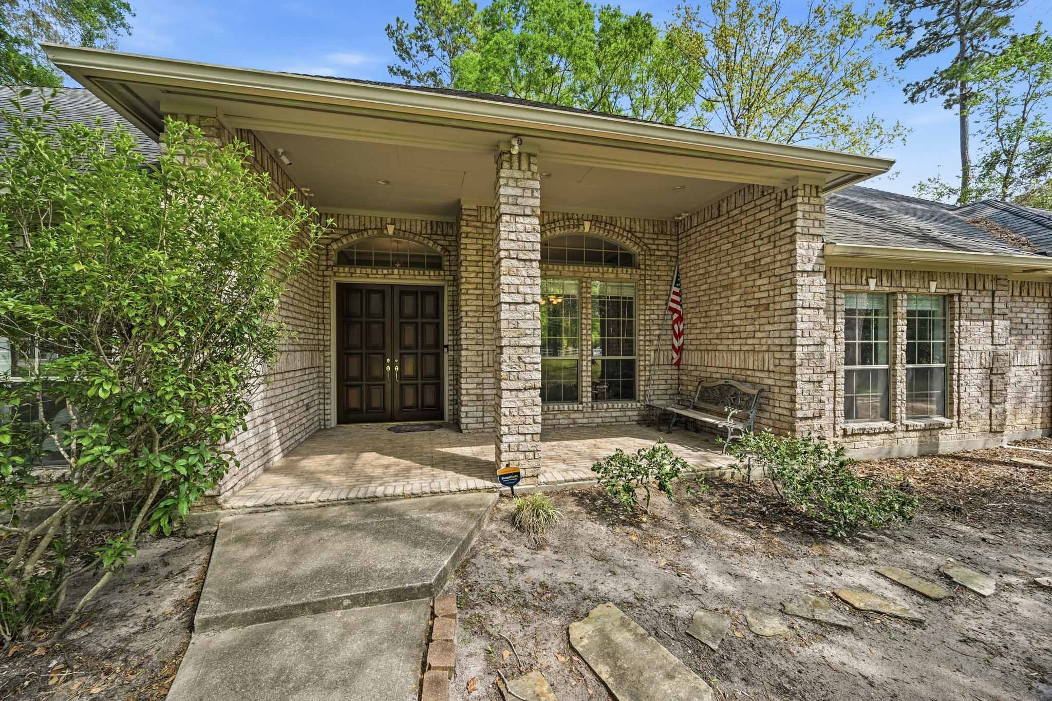 11995 White Oak Crossing Conroe, TX 77385 - Photo 37 of 44 a view of entrance gate of a house