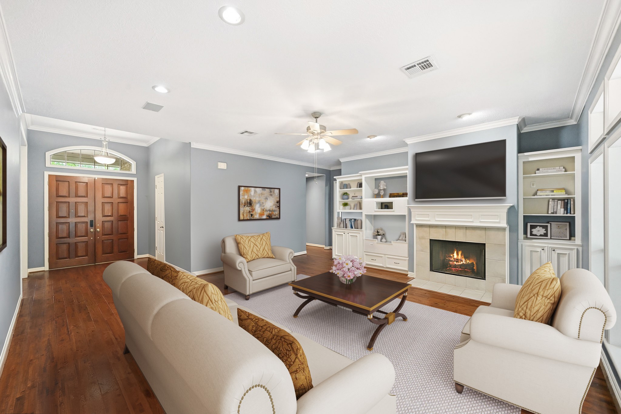 11995 White Oak Crossing Conroe, TX 77385 - Photo 6 of 44 a living room with furniture fireplace and flat screen tv