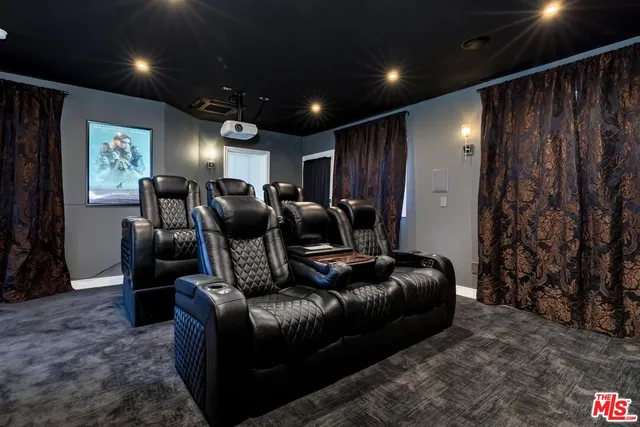 a view of a chairs and table in the patio