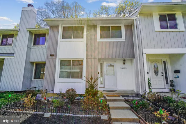 a front view of a house having yard