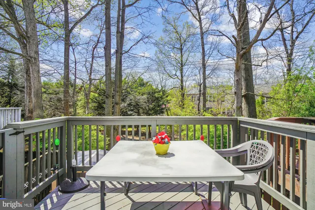 a bedroom with a bed and dresser