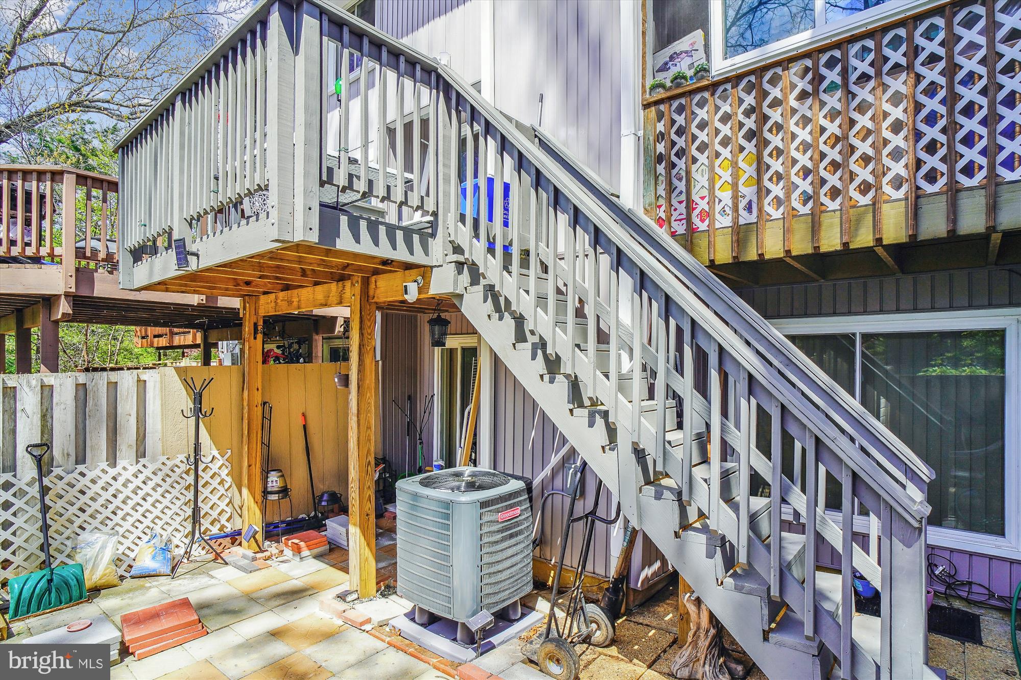 18605 Glen Willow Way Germantown, MD 20874 - Photo 23 of 66 Stairs from upper lvl deck to lower lvl patio.