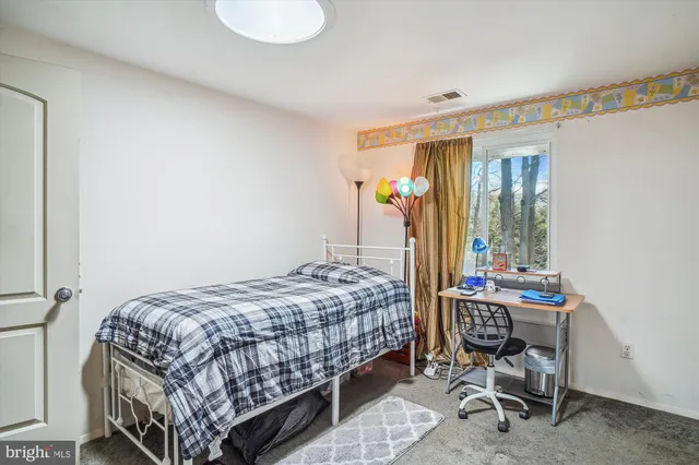 a bathroom with a sink toilet and a shower