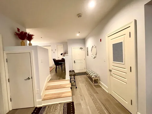 a bedroom with a bed and a table in it