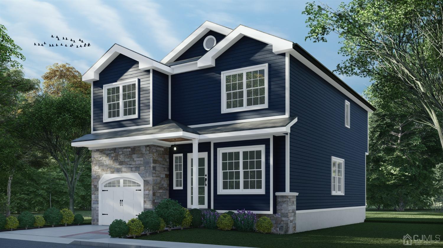 753 Myrtle Road North Brunswick, NJ 08902 - Photo 2 of 20 a front view of a house with a garden
