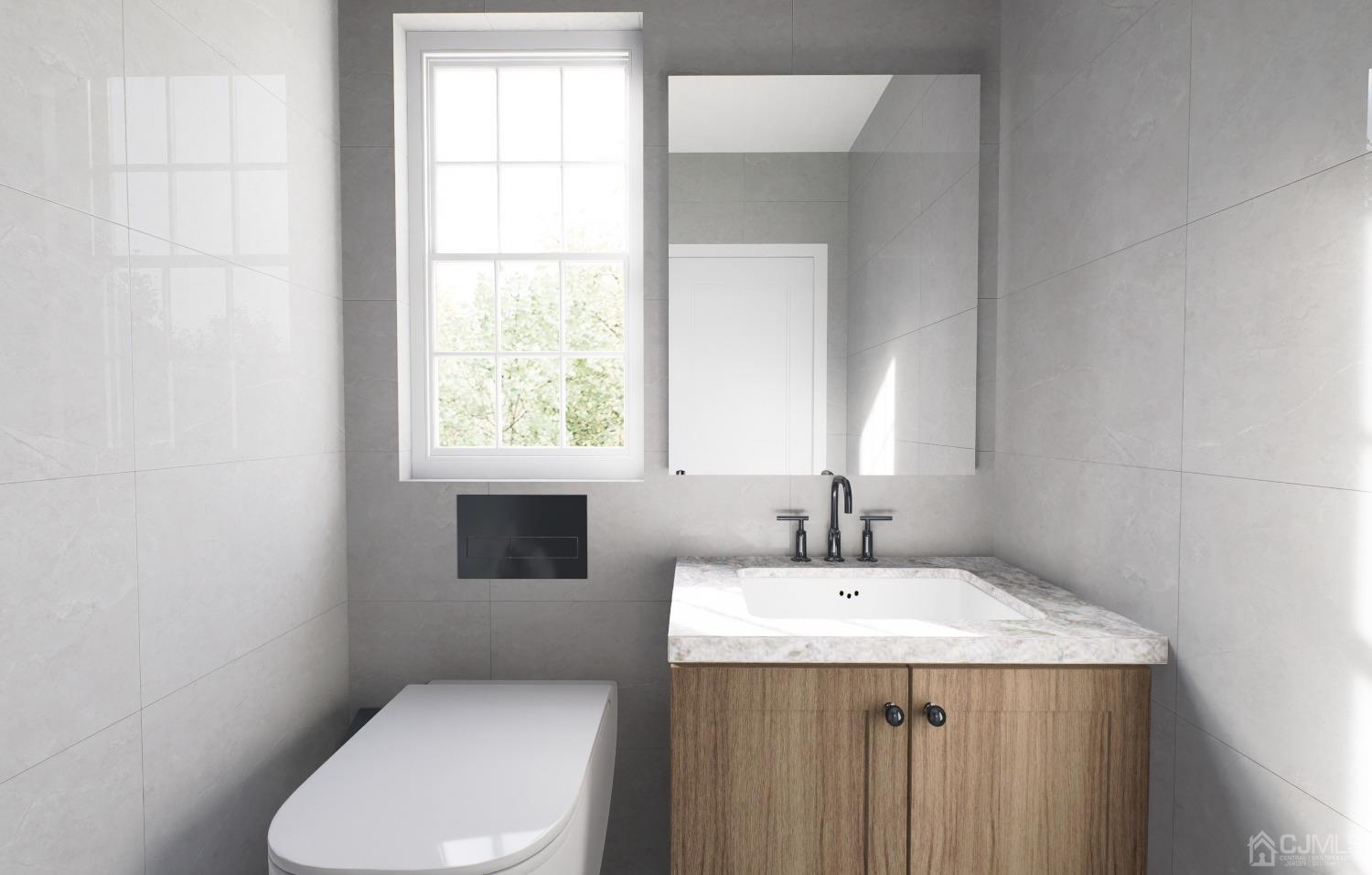 753 Myrtle Road North Brunswick, NJ 08902 - Photo 10 of 20 a bathroom with a toilet sink and mirror
