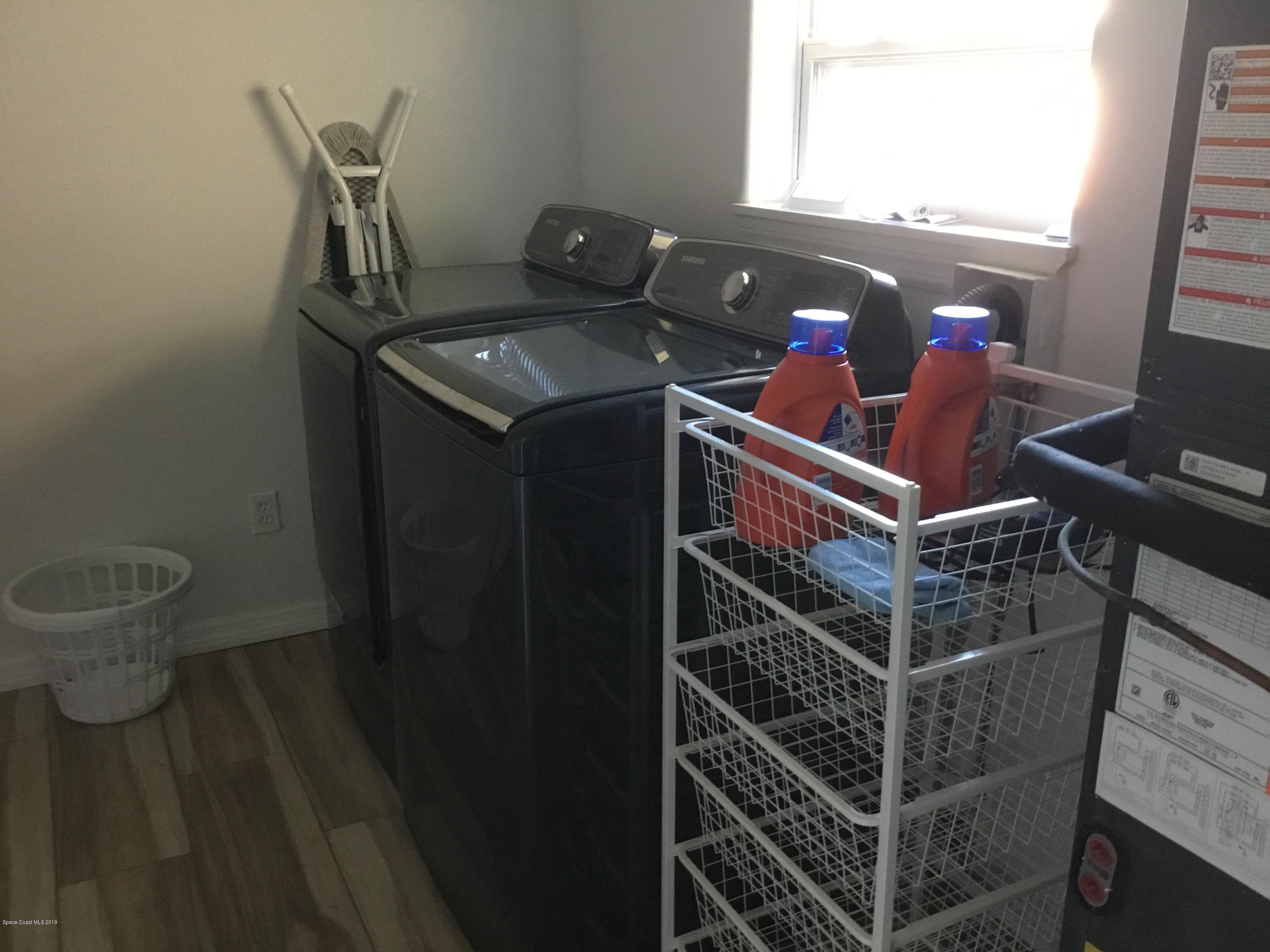 453 Capri Road Cocoa Beach, FL 32931 - Photo 23 of 30 a view of entryway with a window