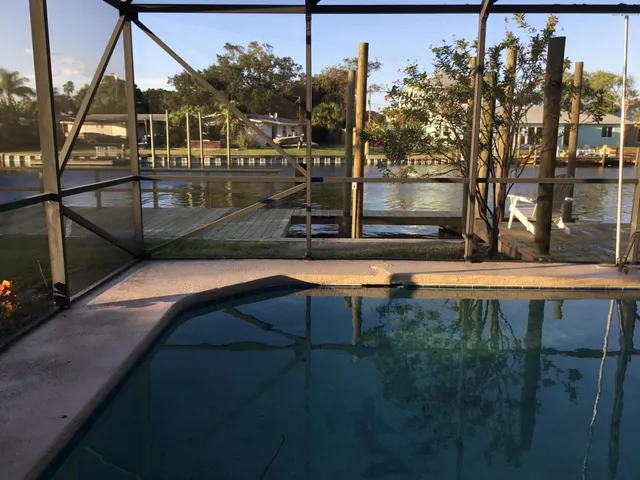 a view of outdoor space and swimming pool