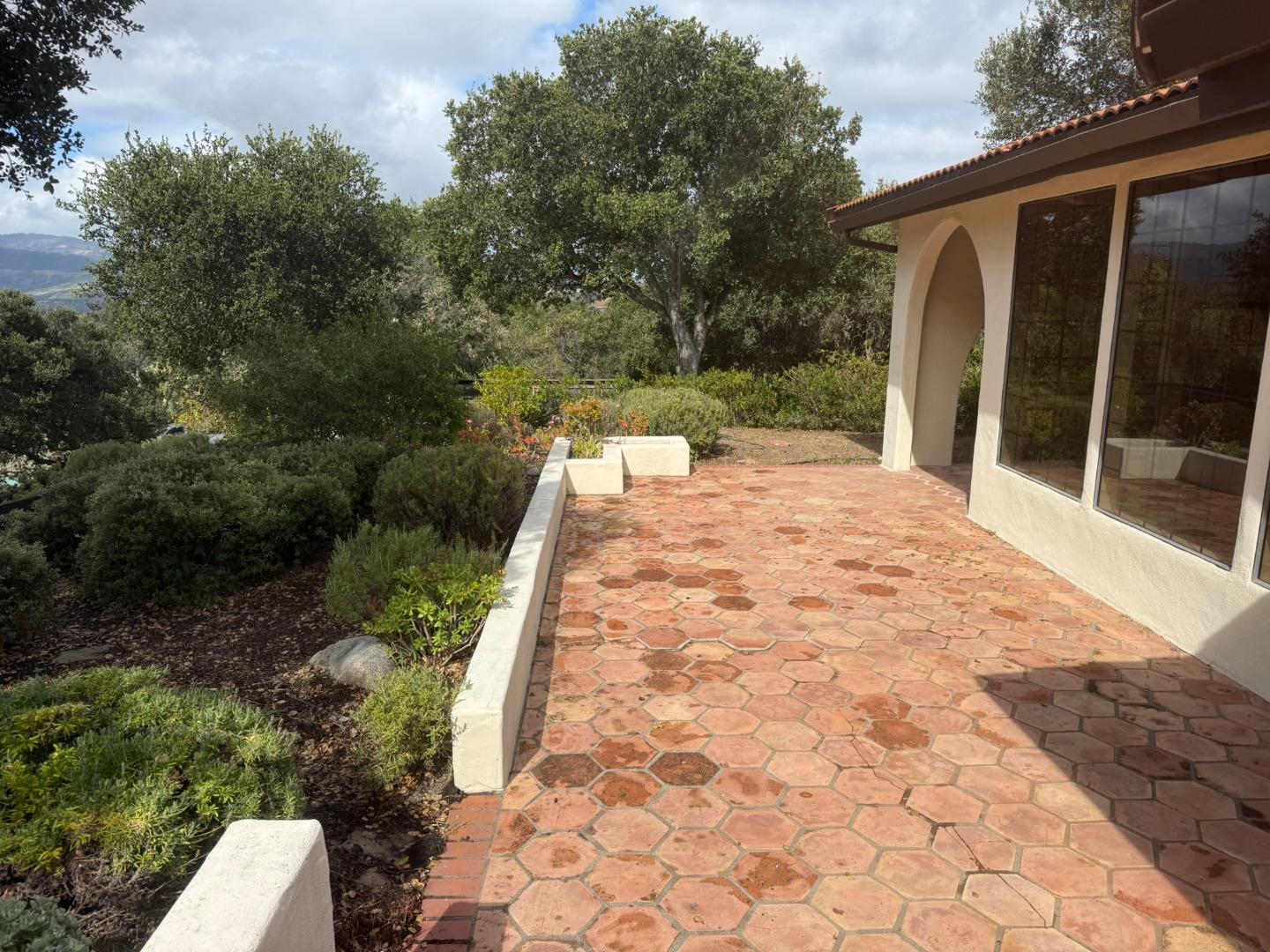11585 McCarthy Road Carmel Valley, CA 93924 - Photo 7 of 52 a backyard of a house with lots of green space