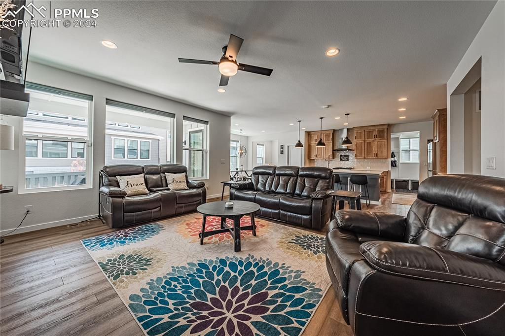 11148 Cloud Shadow Road Littleton, CO 80125 - Photo 15 of 46 a living room with furniture and a large window