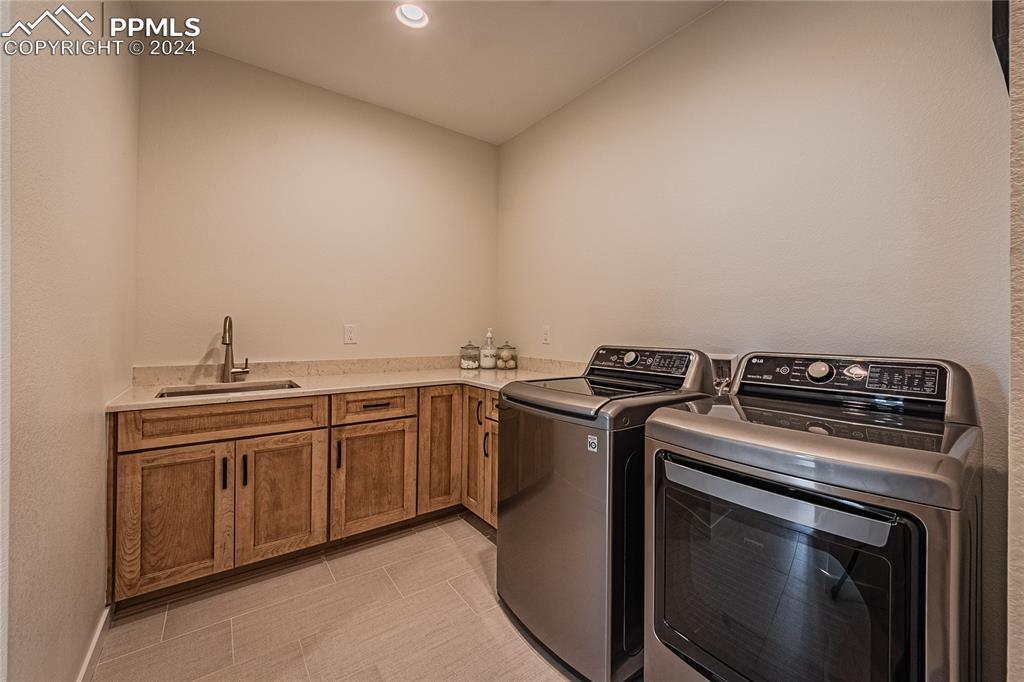 11148 Cloud Shadow Road Littleton, CO 80125 - Photo 24 of 46 a stove top oven sitting inside of a kitchen