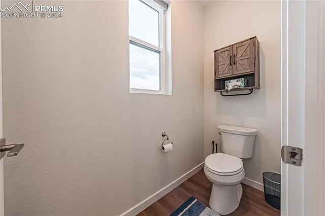 a spacious bathroom with a double vanity sink and a mirror