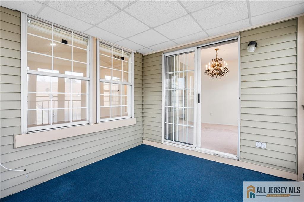11A Rothwell Drive, Unit 11D Monroe Township, NJ 08831 - Photo 14 of 43 a view of an empty room with a window