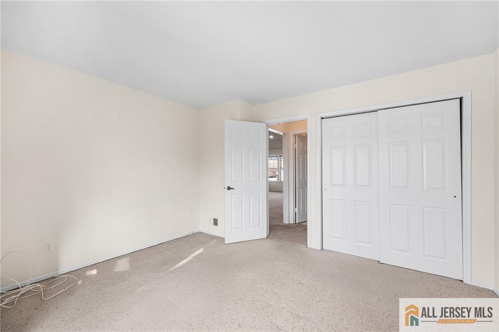 11A Rothwell Drive, Unit 11D Monroe Township, NJ 08831 - Photo 23 of 43 a view of an empty room