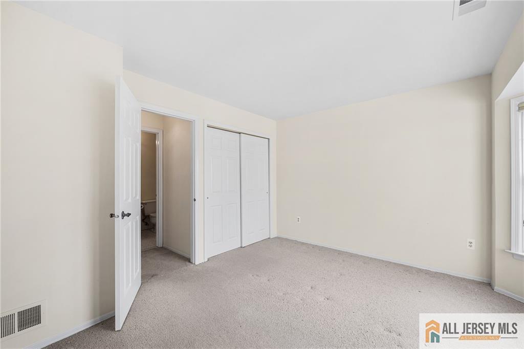 11A Rothwell Drive, Unit 11D Monroe Township, NJ 08831 - Photo 24 of 43 a view of an empty room