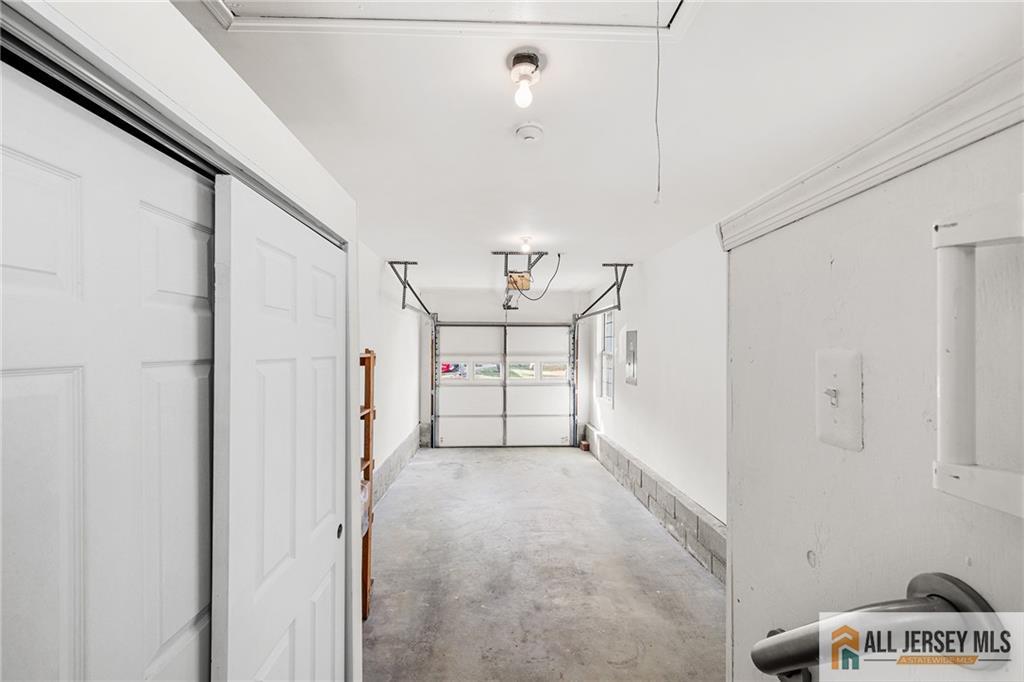 11A Rothwell Drive, Unit 11D Monroe Township, NJ 08831 - Photo 30 of 43 a view of a hallway with a white walls
