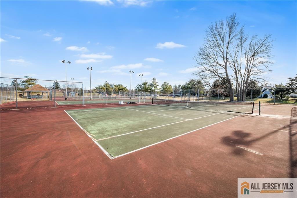 11A Rothwell Drive, Unit 11D Monroe Township, NJ 08831 - Photo 36 of 43 a view of a tennis court