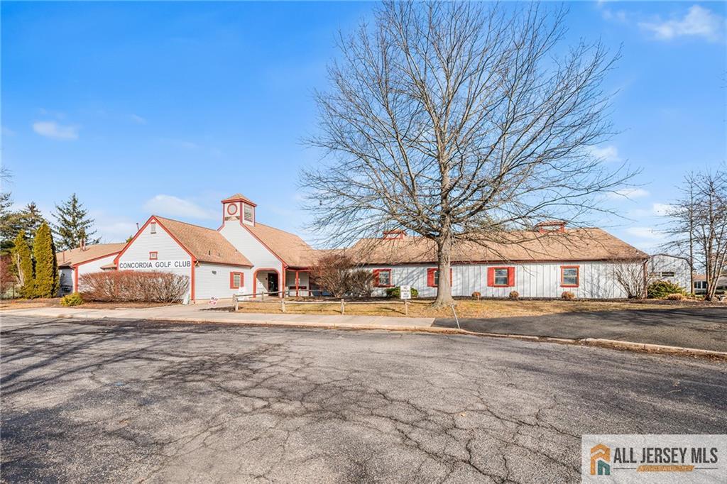 11A Rothwell Drive, Unit 11D Monroe Township, NJ 08831 - Photo 40 of 43 a front view of a house with a yard