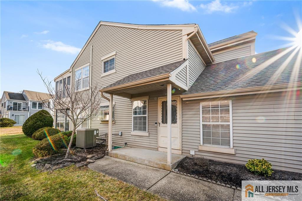 11A Rothwell Drive, Unit 11D Monroe Township, NJ 08831 - Photo 4 of 43 a view of a house with a yard and sitting space