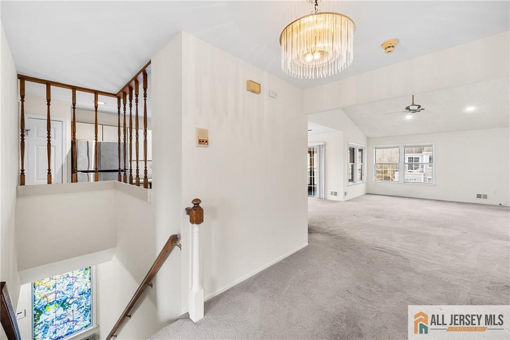 11A Rothwell Drive, Unit 11D Monroe Township, NJ 08831 - Photo 6 of 43 a view of hallway with furniture