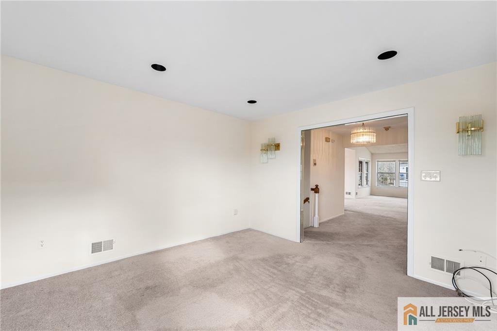 11A Rothwell Drive, Unit 11D Monroe Township, NJ 08831 - Photo 9 of 43 a view of an empty room