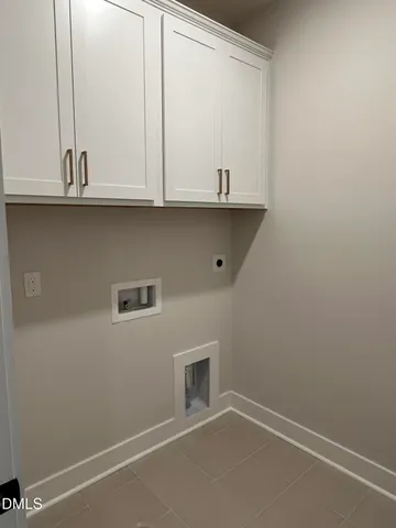 a view of cabinets and window