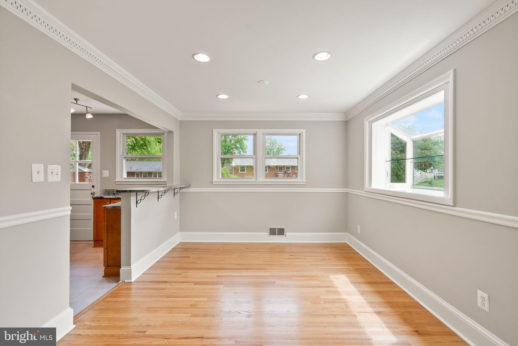 5301 Nutting Drive Springfield, VA 22151 - Photo 12 of 43 a view of a kitchen with wooden floor and a window