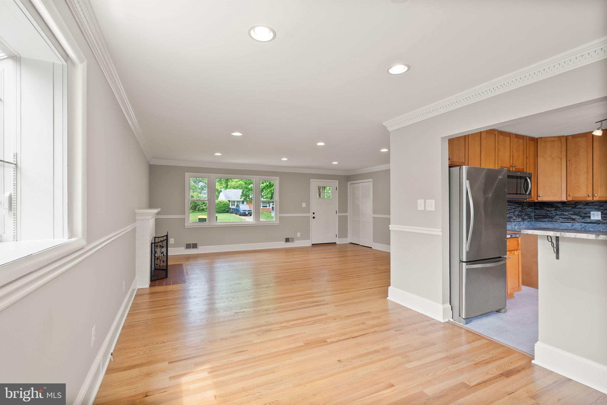 5301 Nutting Drive Springfield, VA 22151 - Photo 14 of 43 a view of a kitchen with a refrigerator and a stove