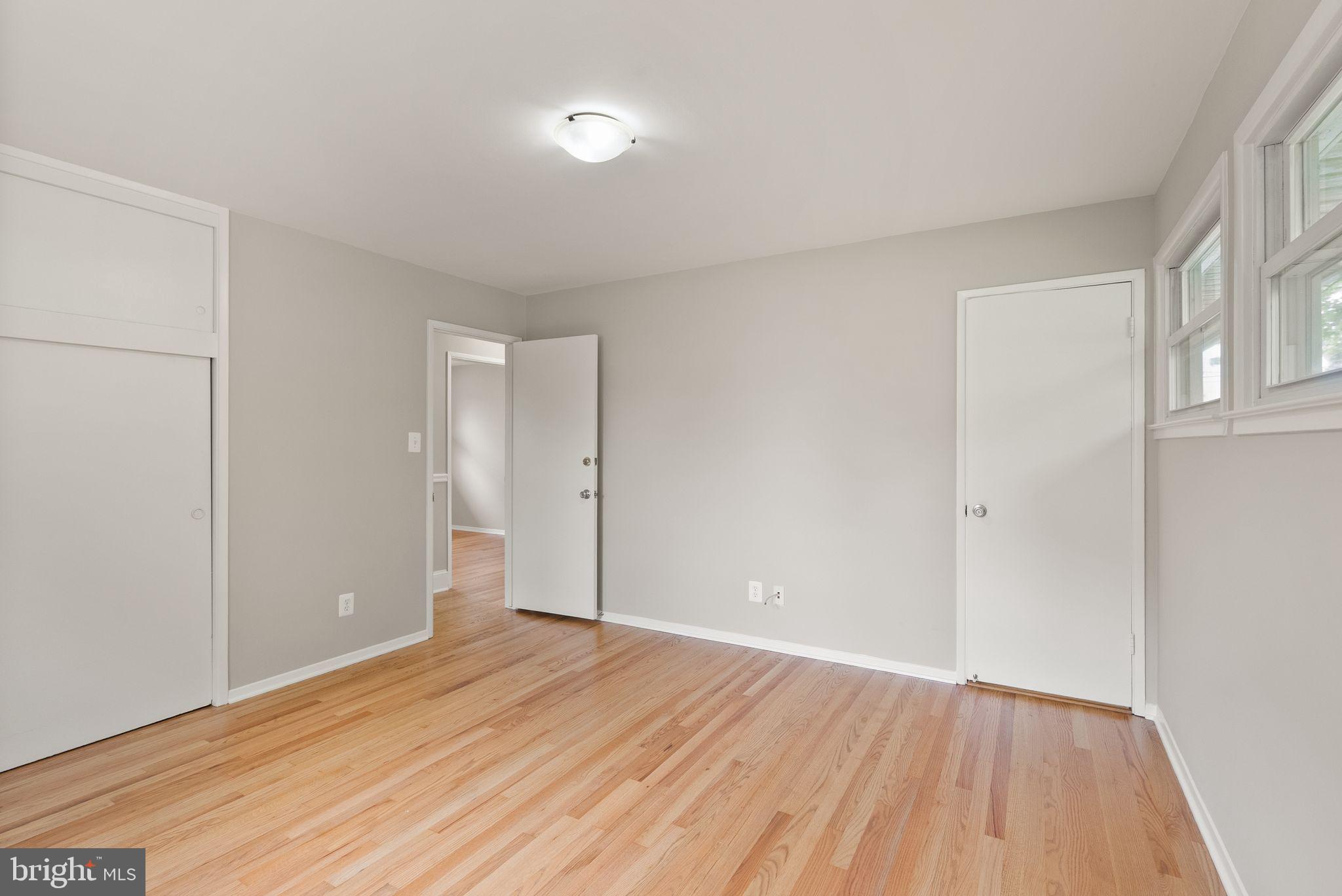 5301 Nutting Drive Springfield, VA 22151 - Photo 19 of 43 a view of an empty room with wooden floor