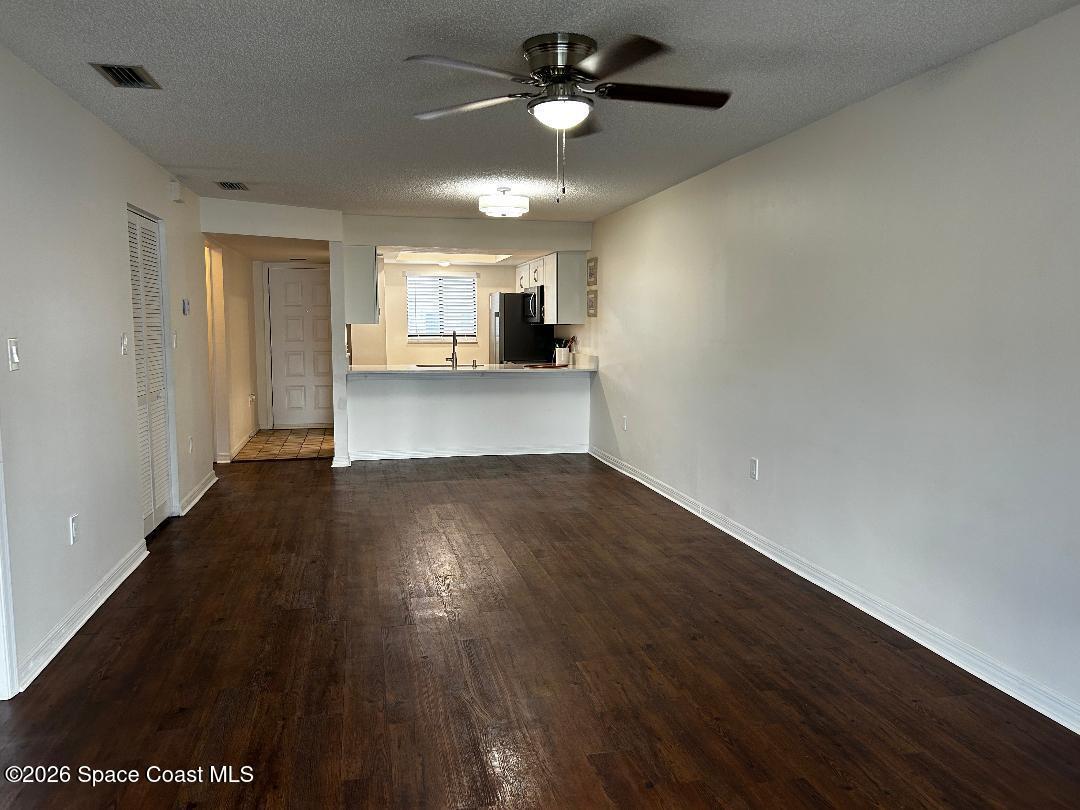 1720 Murrell Road, Unit 207 Rockledge, FL 32955 - Photo 11 of 23 family rm new bulbs