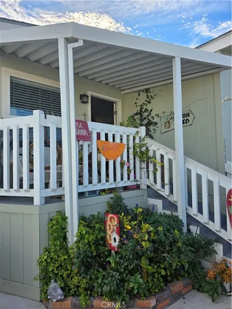 front view of a house with a small yard