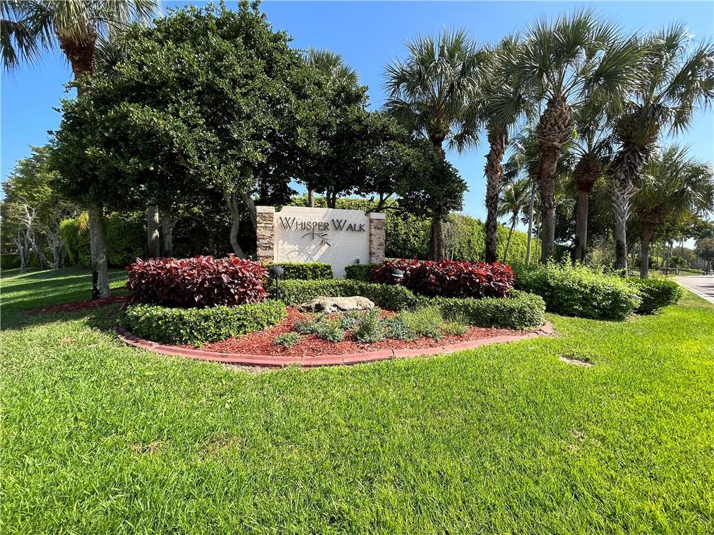 8673 Sunbird Place Boca Raton, FL 33496 - Photo 26 of 28 a view of a garden with plants and trees