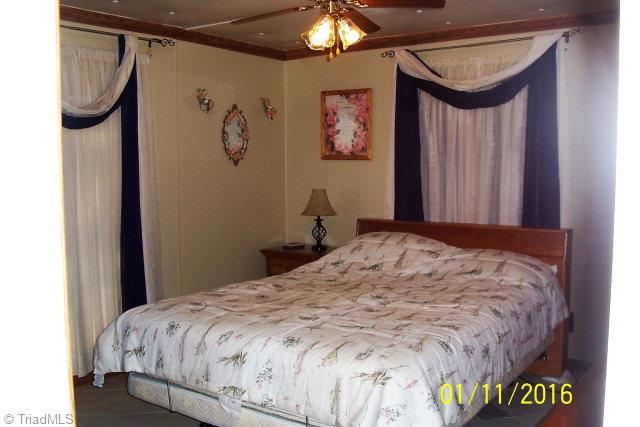226 Dockery Road Purlear, NC 28665 - Photo 16 of 34 Second Bedroom