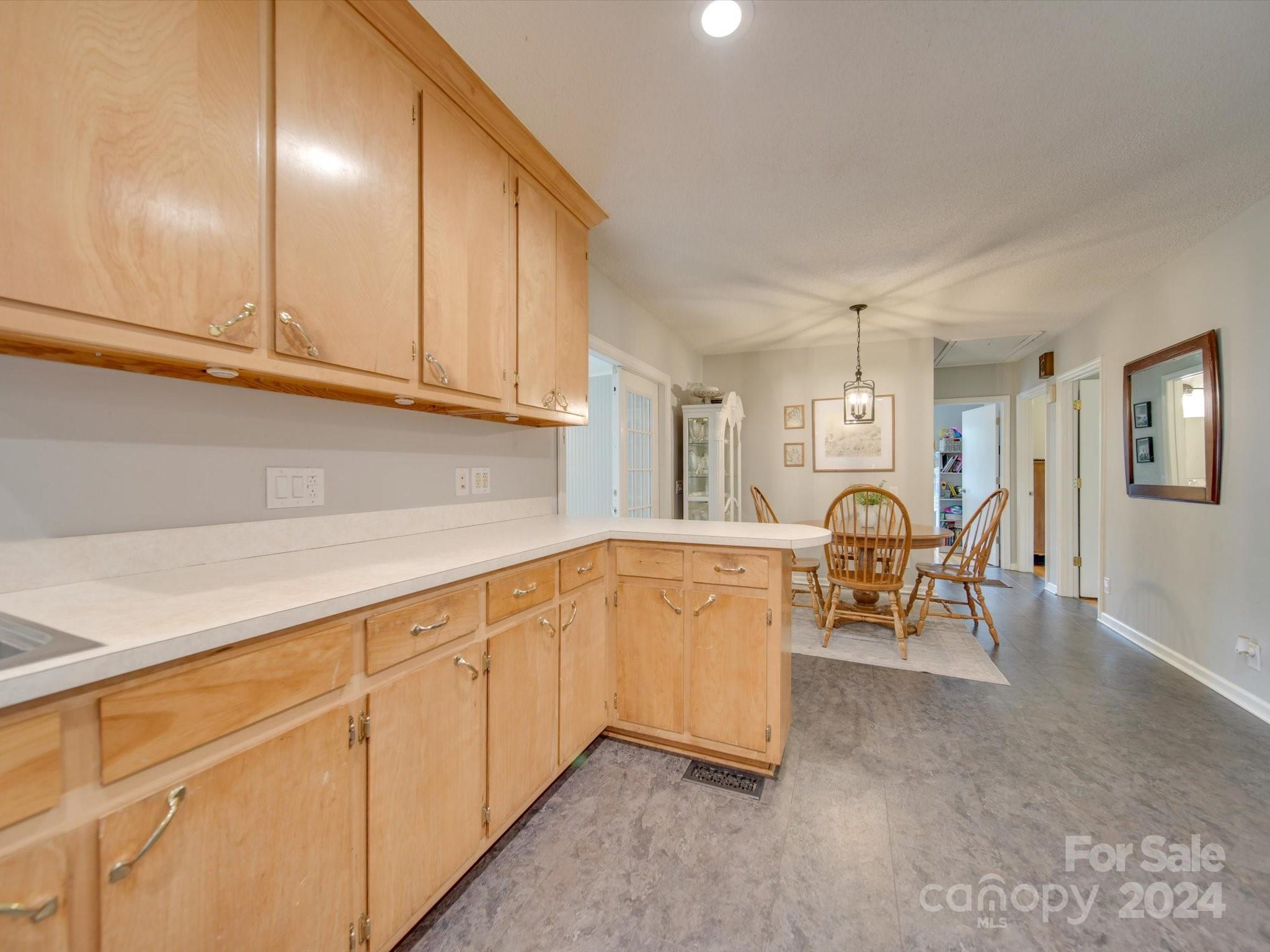 3802 White Store Road Wingate, NC 28174 - Photo 5 of 23 a very nice looking room with white cabinets