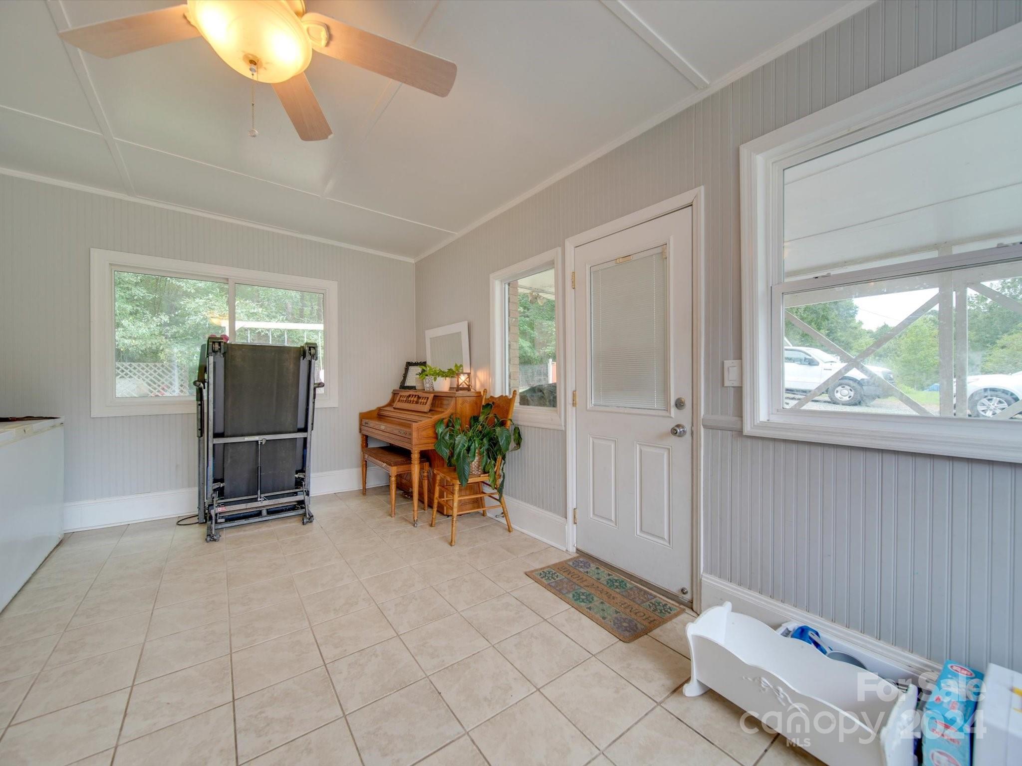 3802 White Store Road Wingate, NC 28174 - Photo 10 of 23 a view of a livingroom with furniture and a window