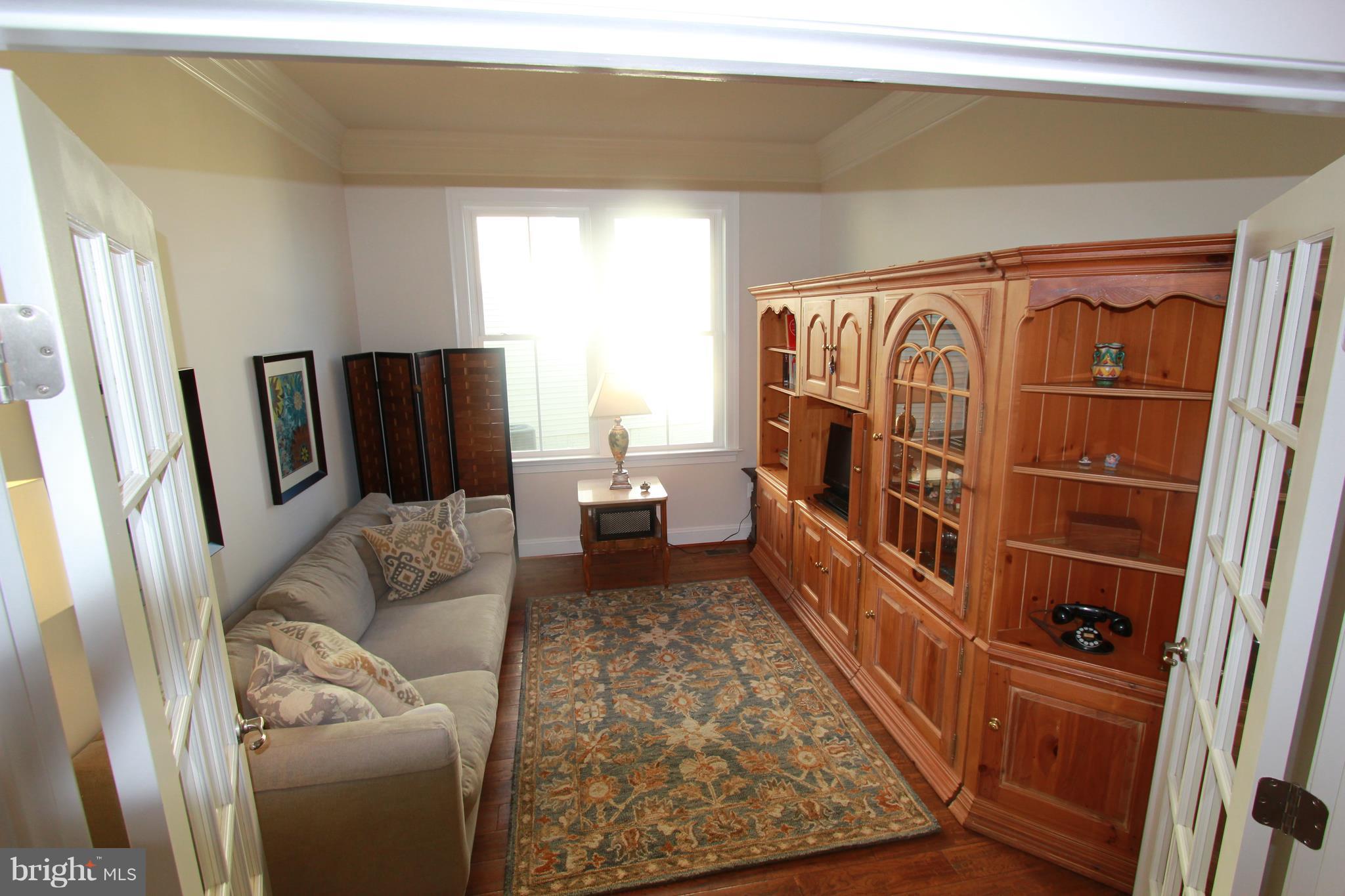 2972 Levee Drive Odenton, MD 21113 - Photo 17 of 30 a living room with furniture and a rug