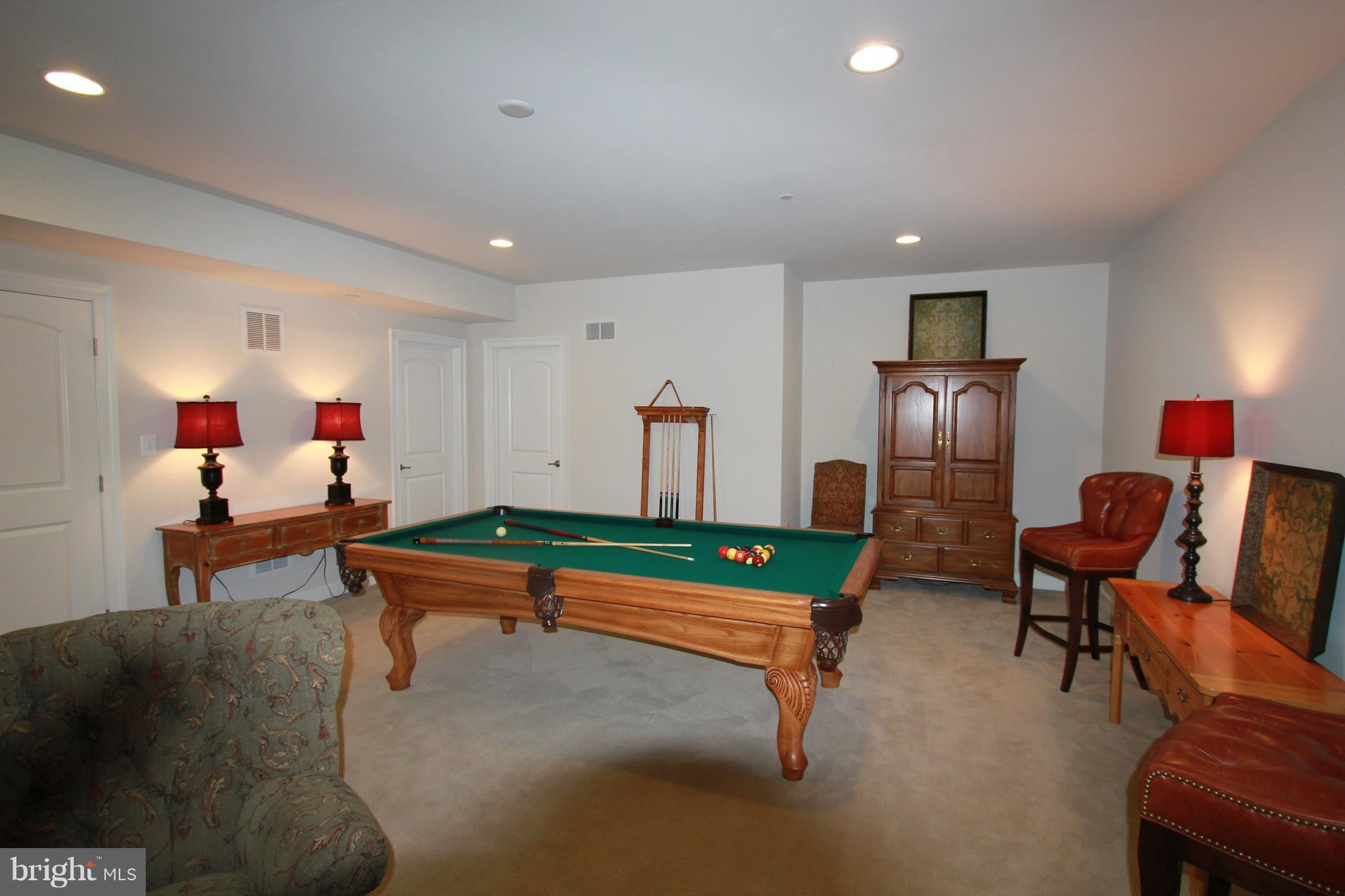 2972 Levee Drive Odenton, MD 21113 - Photo 22 of 30 a room with furniture pool table gym equipment wooden floor and windows