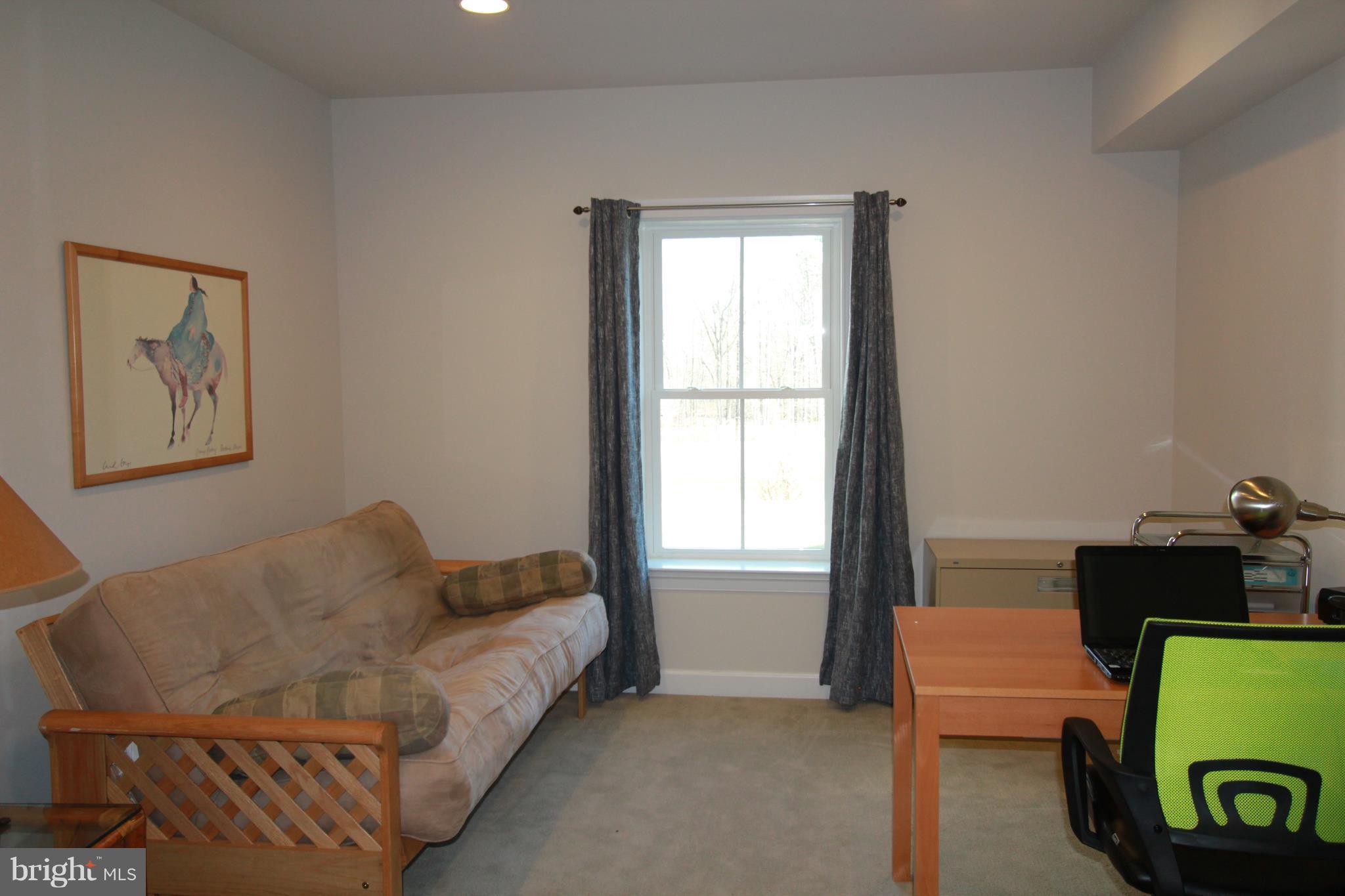 2972 Levee Drive Odenton, MD 21113 - Photo 23 of 30 a living room with furniture and a window