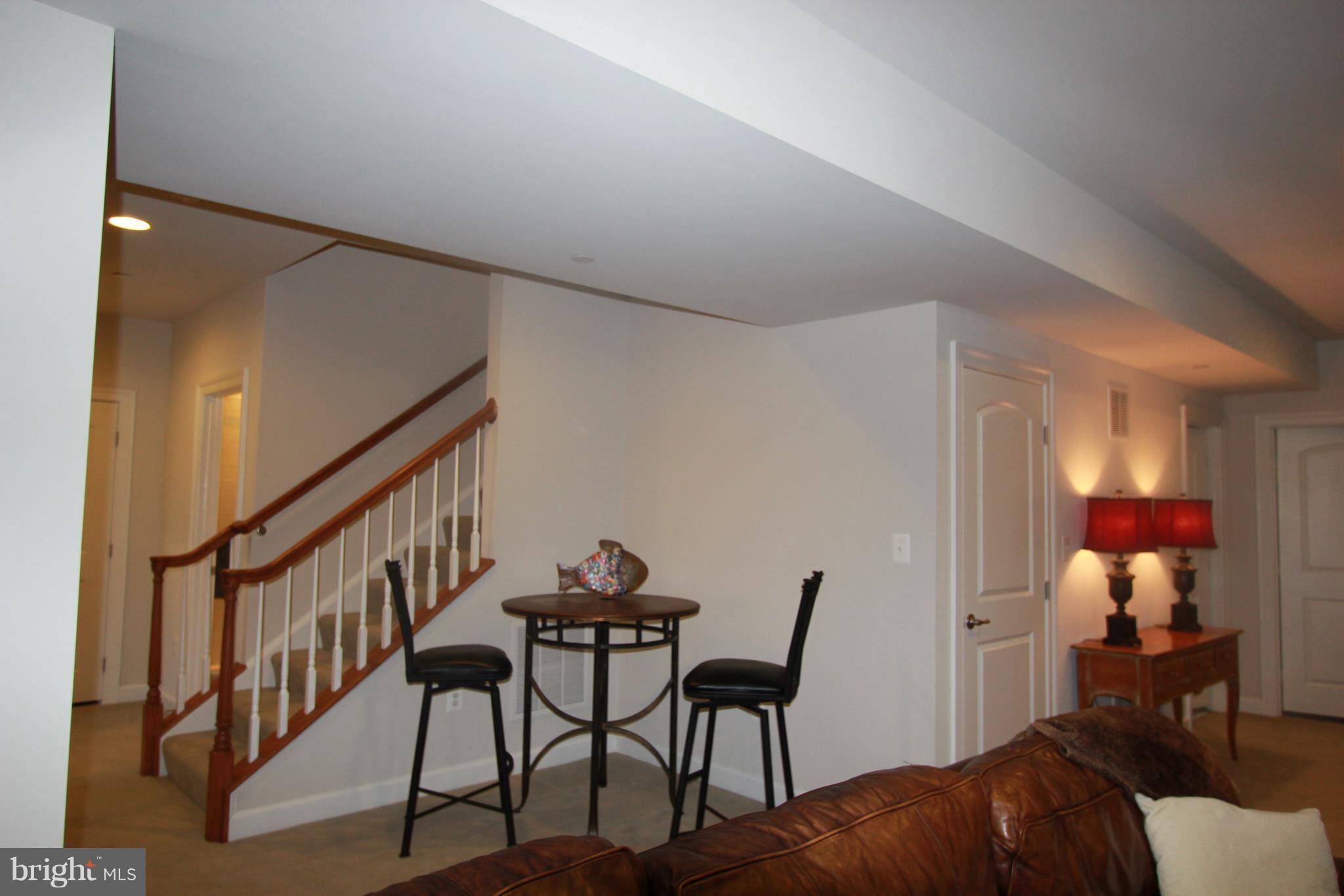 2972 Levee Drive Odenton, MD 21113 - Photo 25 of 30 a living room with furniture and a wooden floor