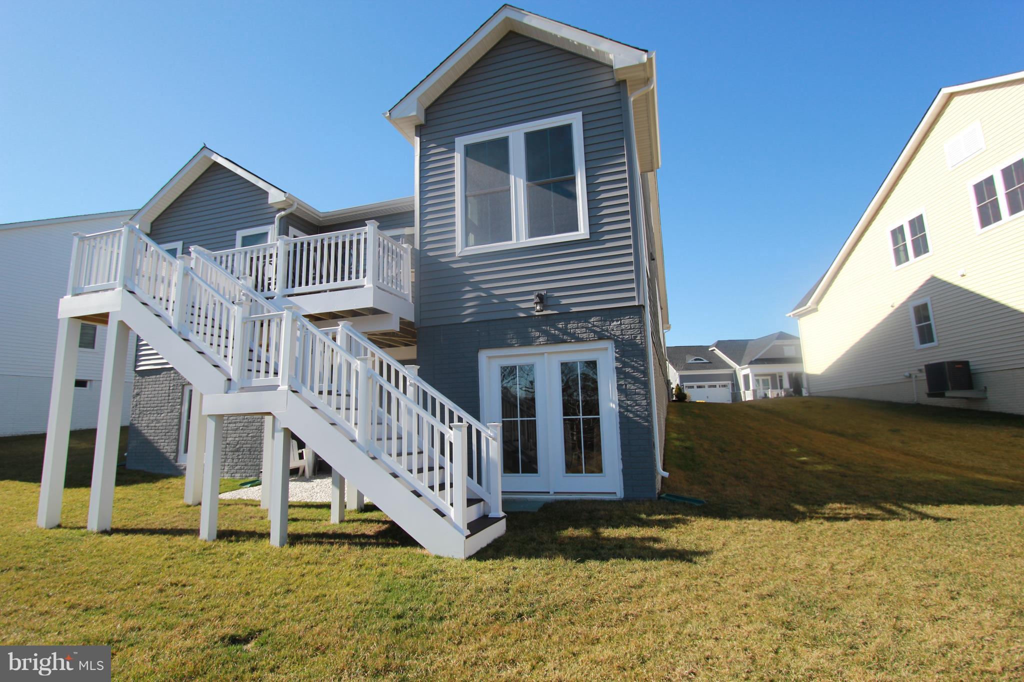 2972 Levee Drive Odenton, MD 21113 - Photo 28 of 30 a view of a house with yard and deck