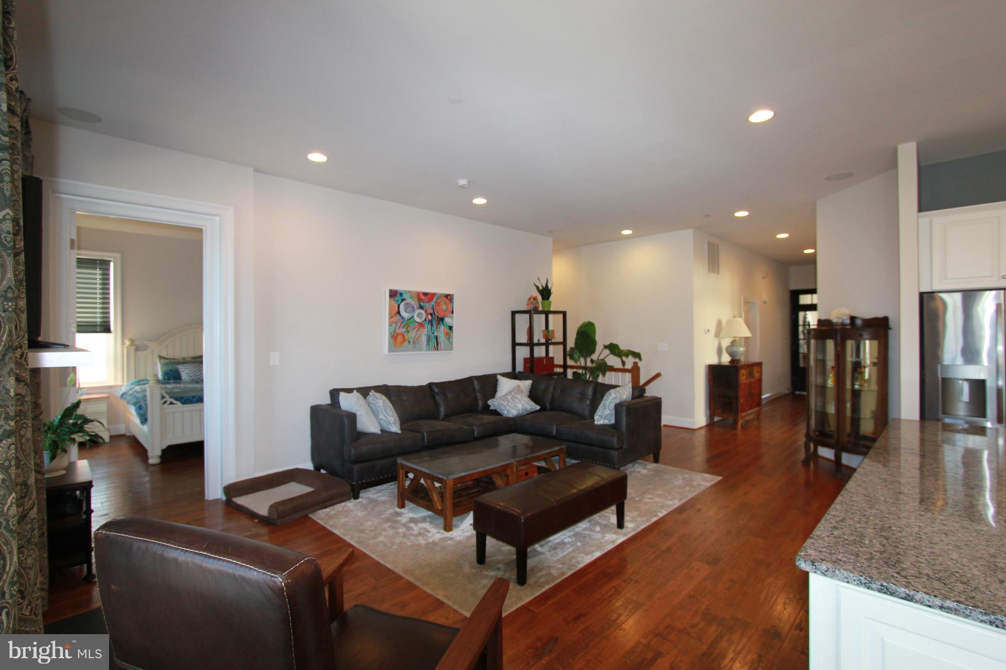 2972 Levee Drive Odenton, MD 21113 - Photo 5 of 30 a living room with furniture and a table