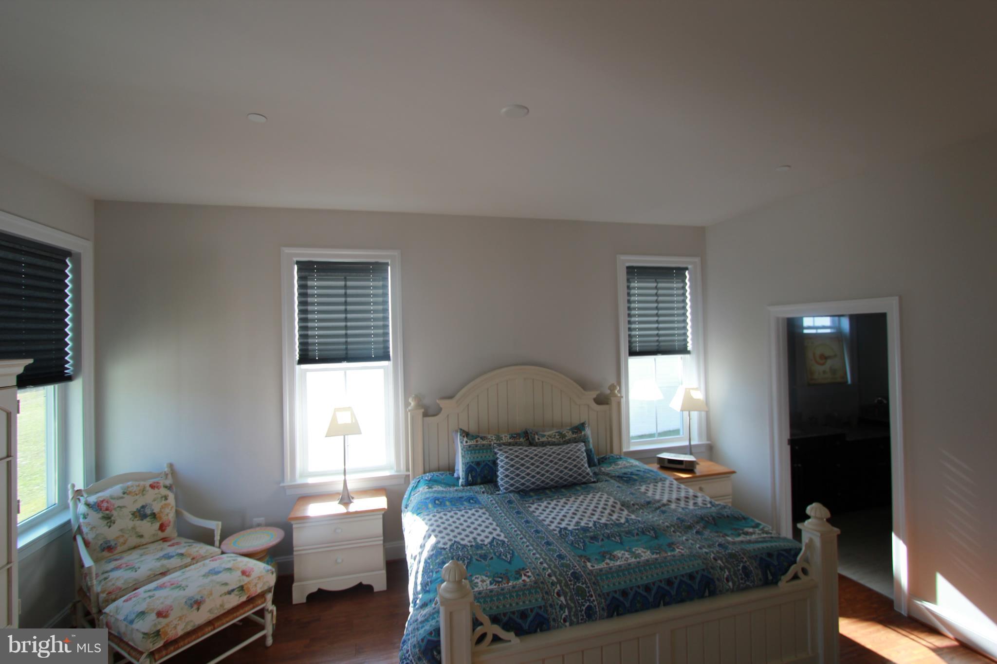 2972 Levee Drive Odenton, MD 21113 - Photo 10 of 30 a bedroom with a bed and wooden floor